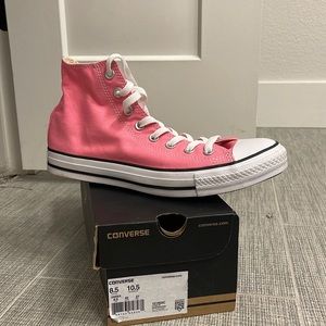 lightly worn womens 10.5 pink high top converse